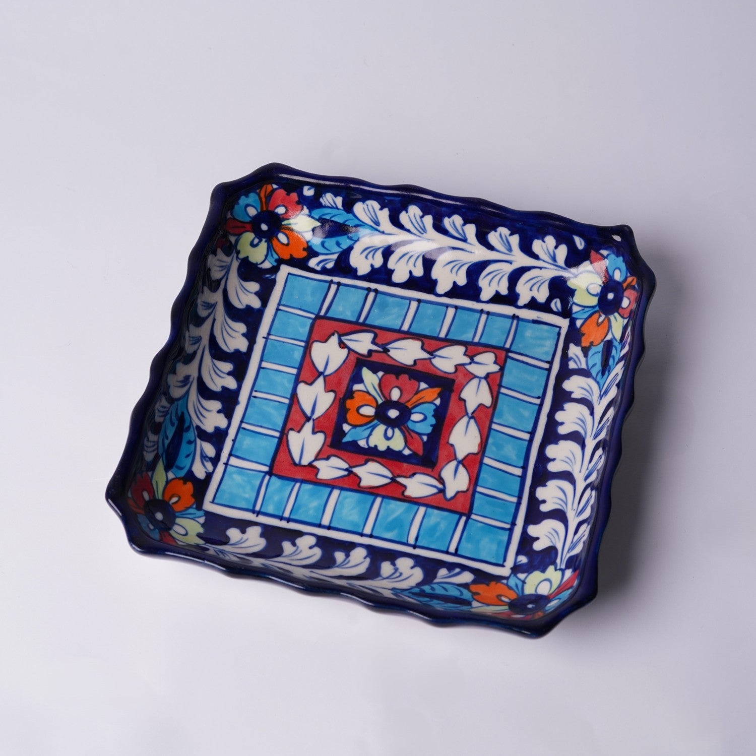 Square dish with central floral motif — Multani ceramic craft — Craftan Pakistan