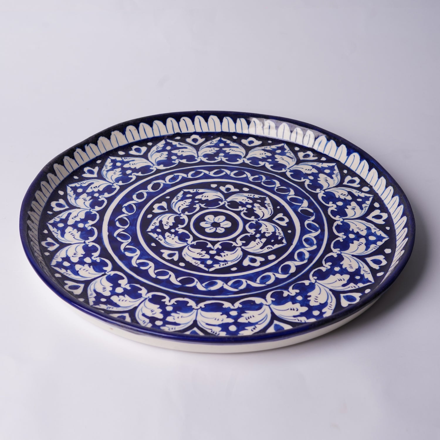 Midnight Blossom 13 inch Pizza Serving Platter — handmade blue pottery — Craftan Pakistan