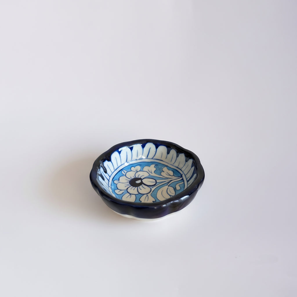 Ceramic serving dish featuring classic blue pottery motifs and patterns — Craftan Pakistan