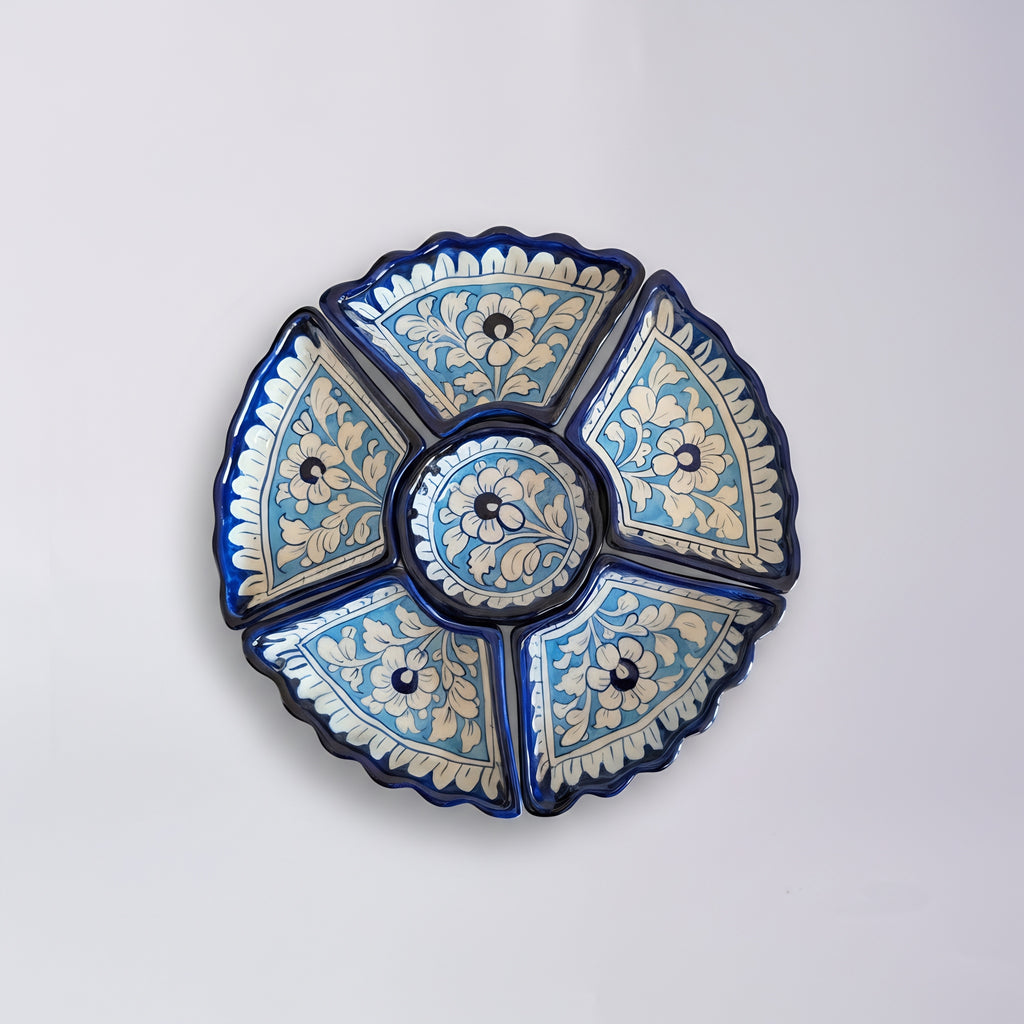 Handmade blue pottery serving dish with intricate floral patterns — Craftan Pakistan