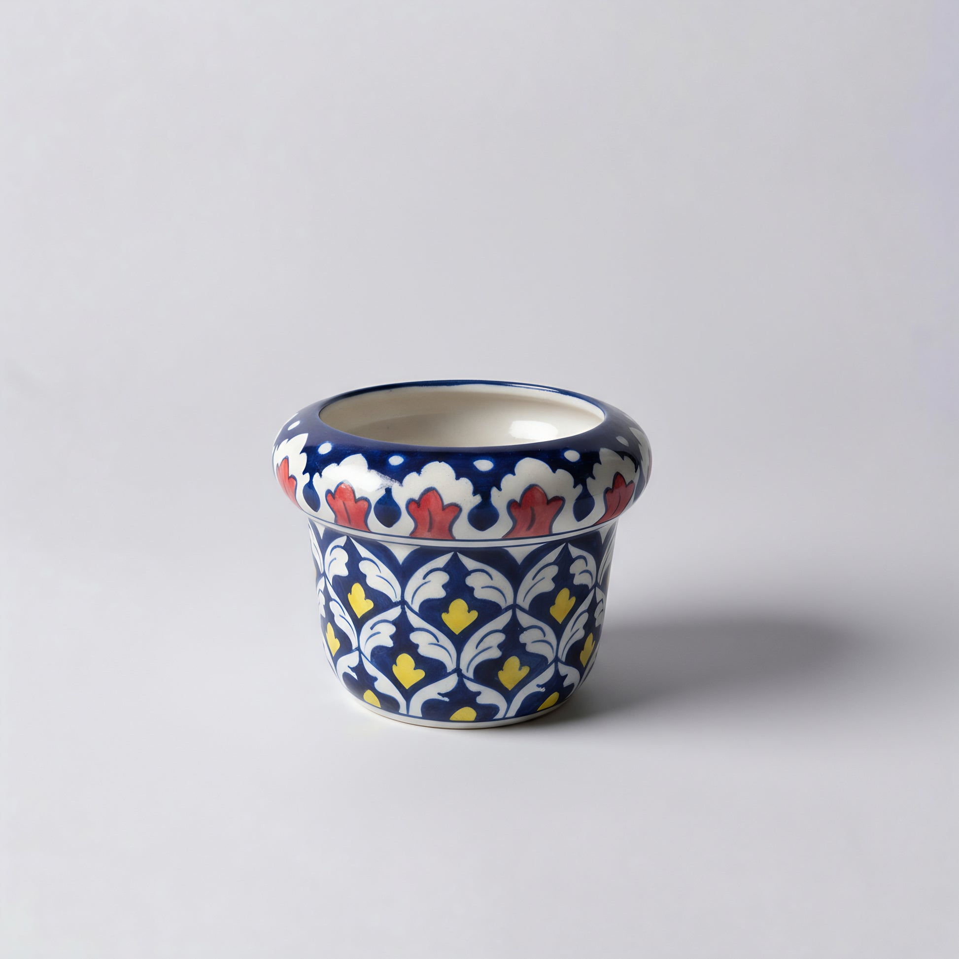 Hand-Painted Blue Pottery Planter — 6″ Wide × 5″ High Multani Ceramic (Red–Yellow Floral Lattice)