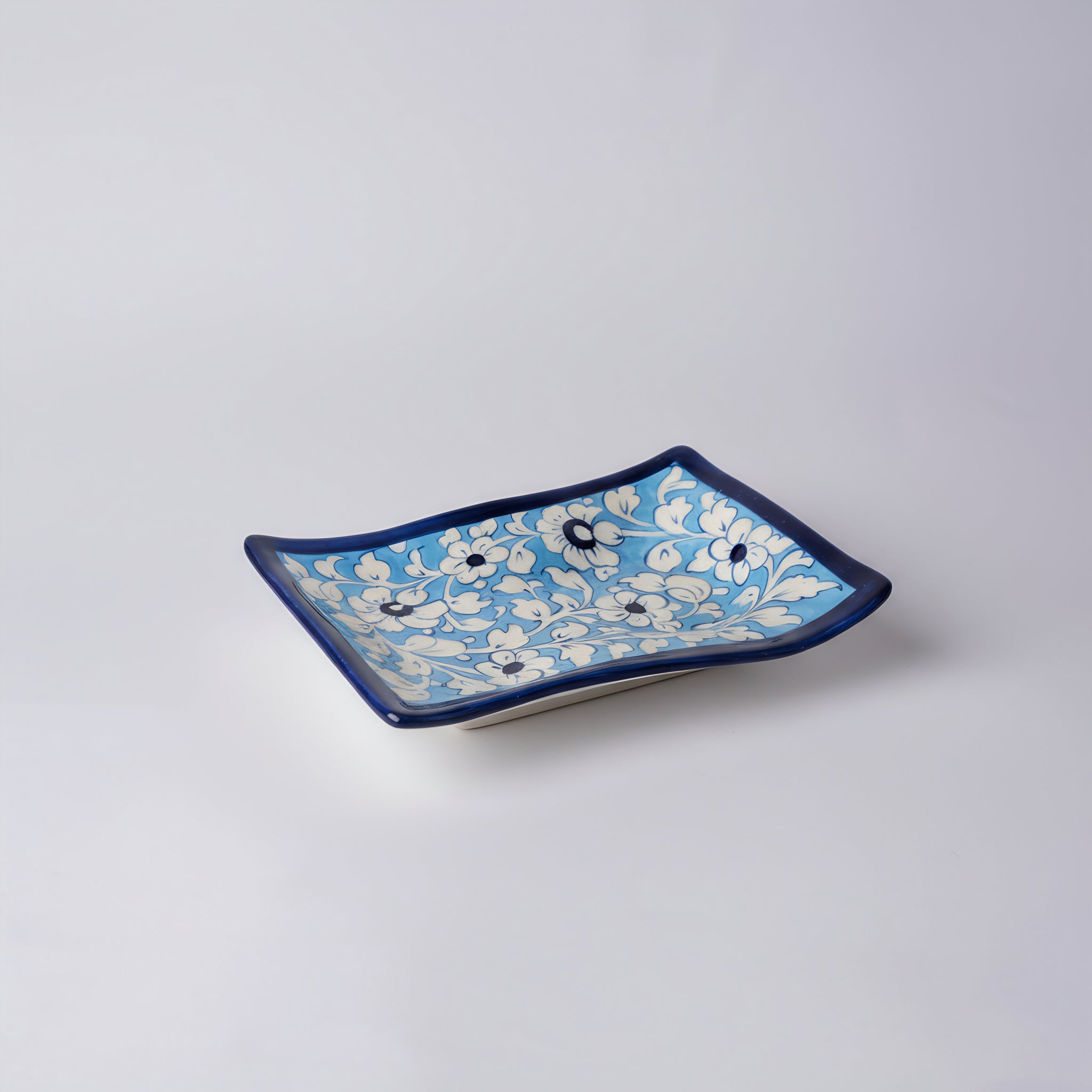 Blue Pottery Wavy Serving Tray — 7″ × 5″ Multani Ceramic (Sky Floral with Cup Crater)