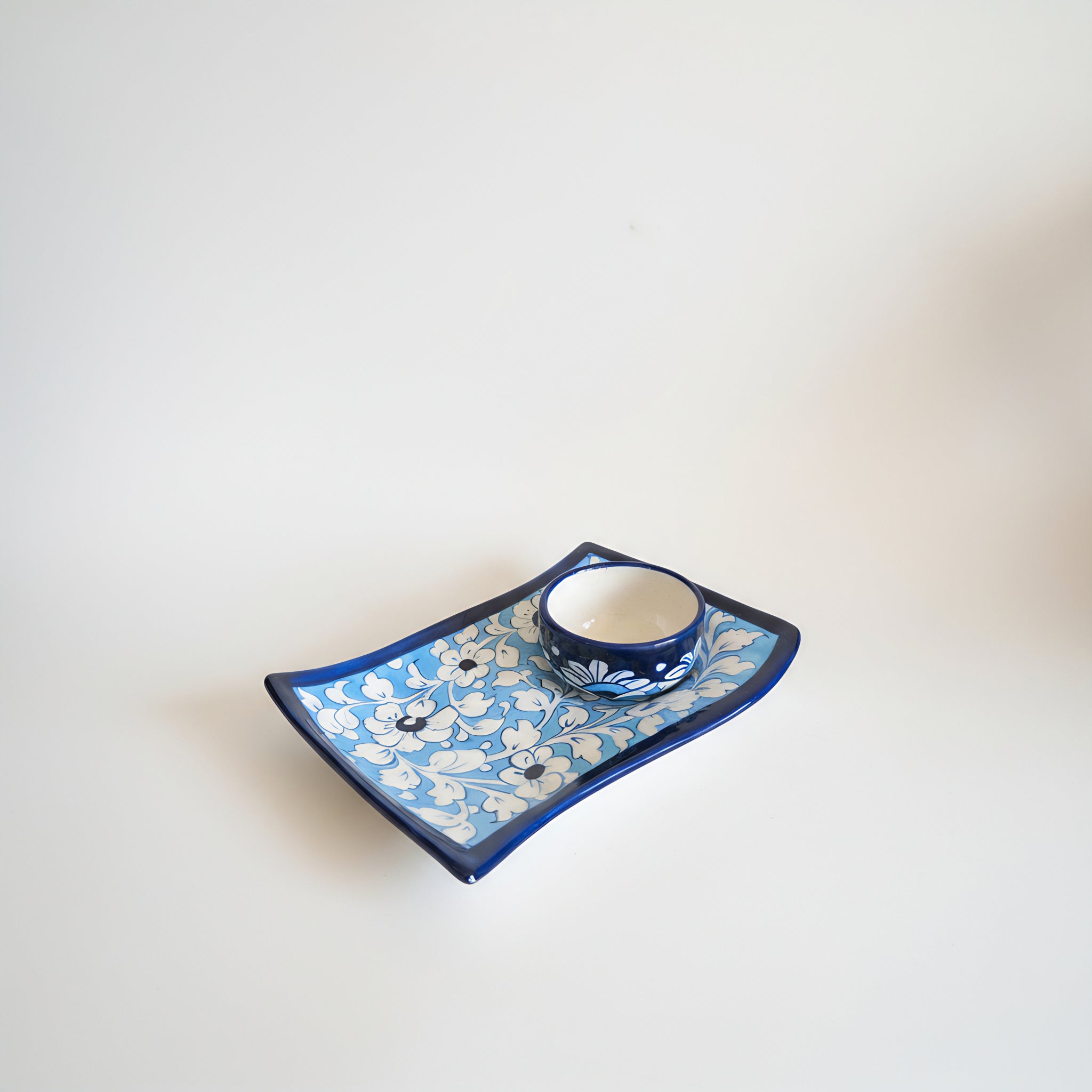 Blue Pottery Wavy Serving Tray — 7″ × 5″ Multani Ceramic (Sky Floral with Cup Crater)
