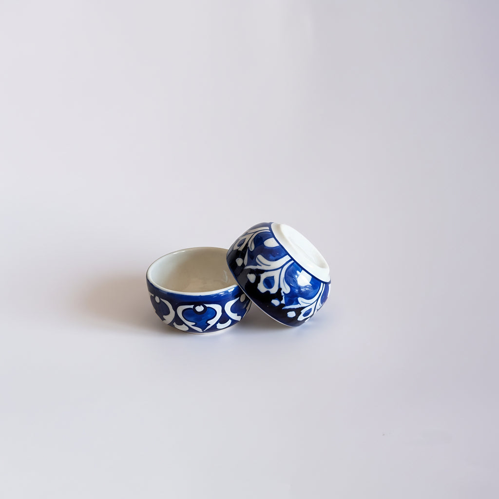 Handmade cobalt blue pottery bowl with intricate arabesque patterns — Craftan Pakistan