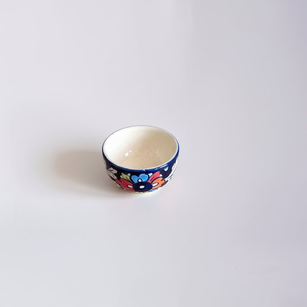 Handcrafted 3-inch ceramic serving bowl featuring traditional multicolor floral design motifs