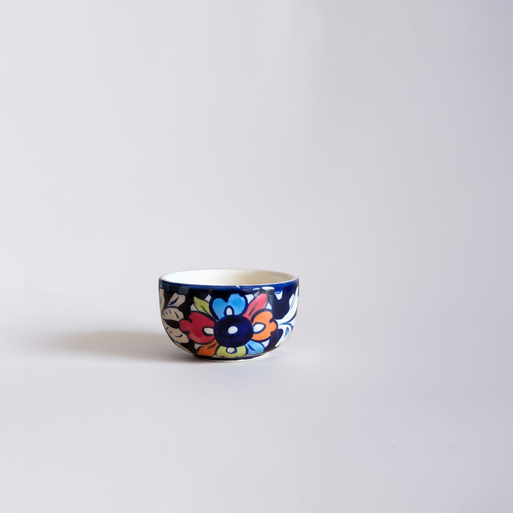 Multani blue pottery bowl with colorful floral patterns — authentic Pakistani craft