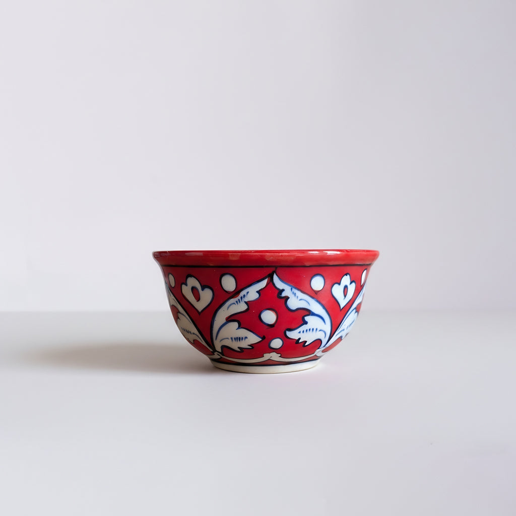 Pakistani artisan blue pottery bowl set showcasing classic red floral artwork — Craftan Pakistan