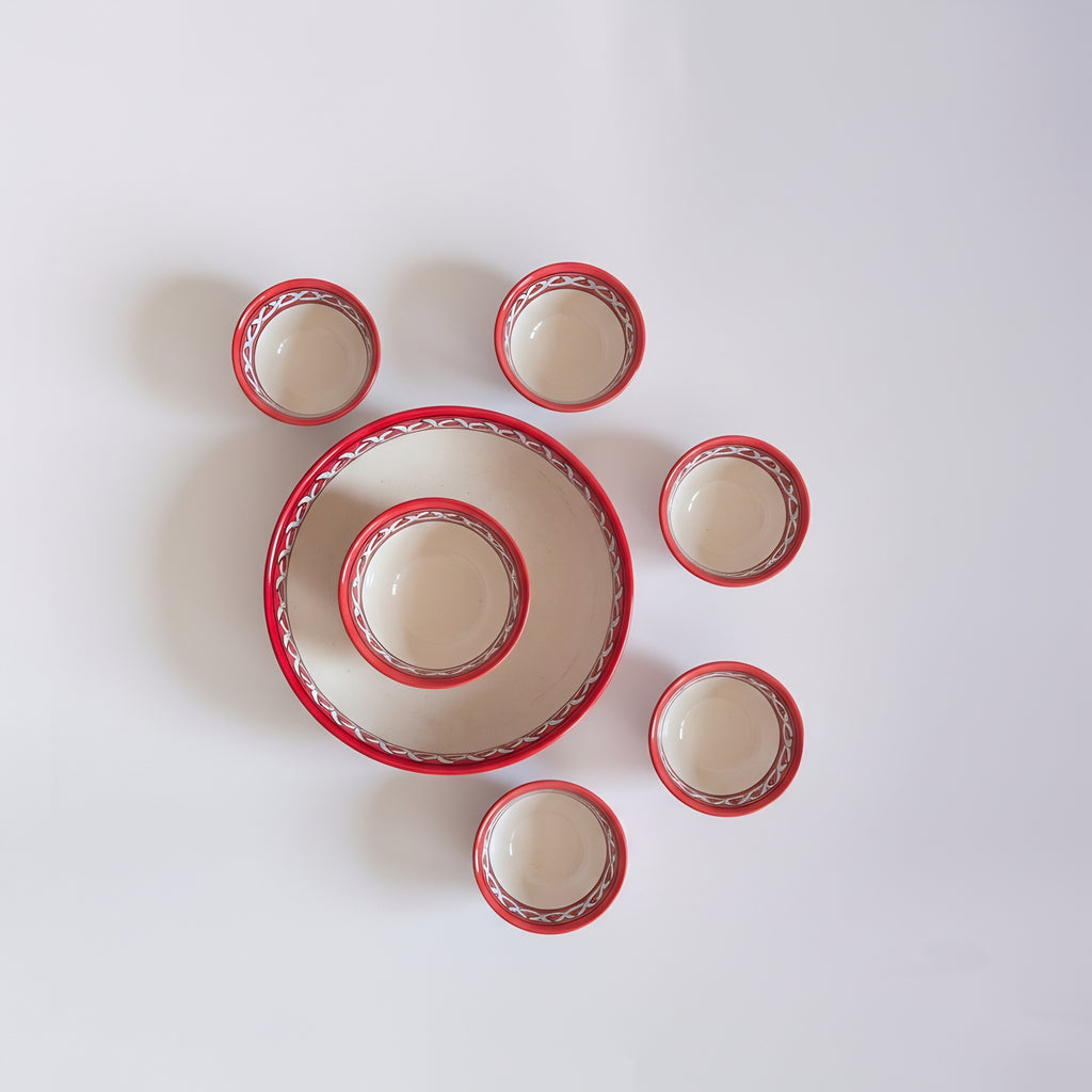 Blue pottery serving bowls with red floral patterns — Multani craft — Craftan Pakistan