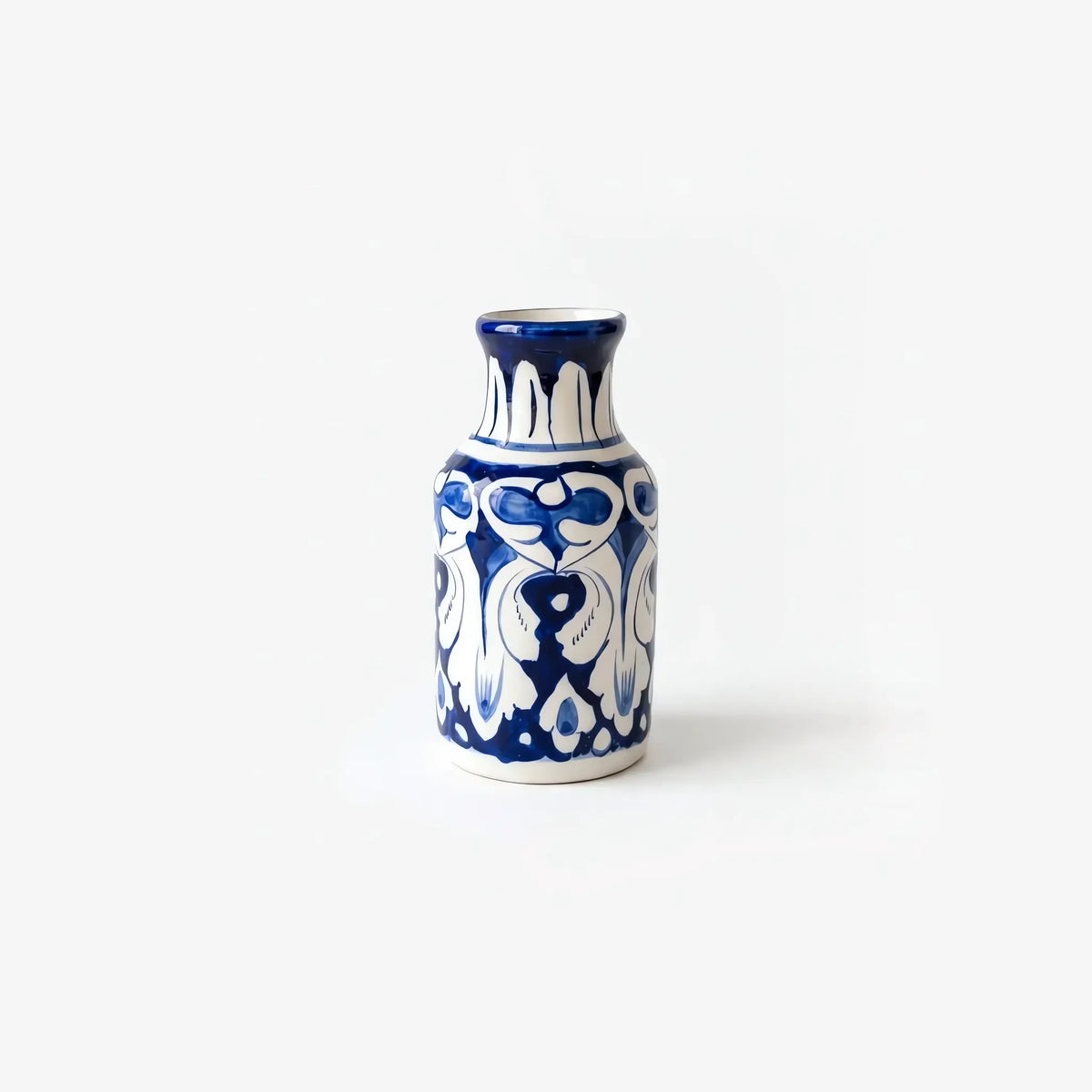 Blue pottery bottle vase, side view showing the arabesque body pattern