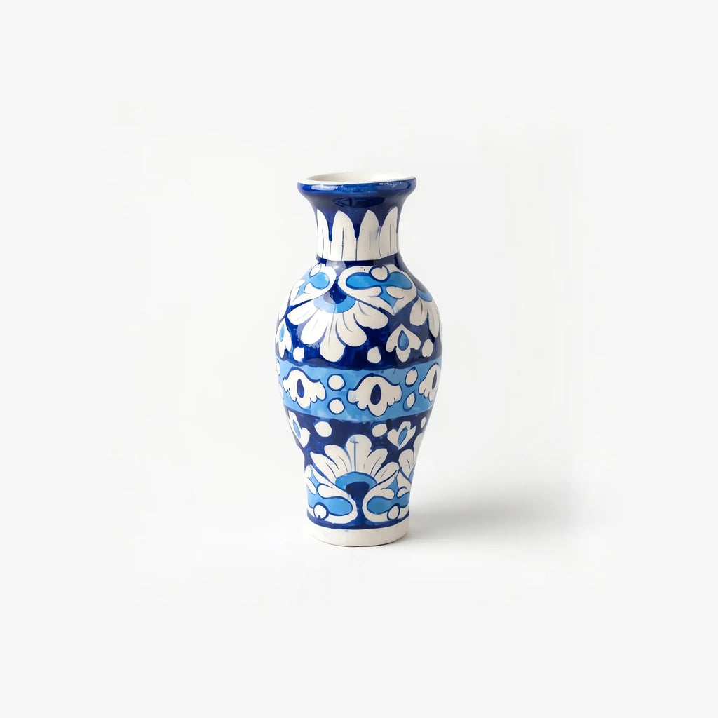 Blue pottery mini vase with white palmettes and sky-blue dotted band, front view