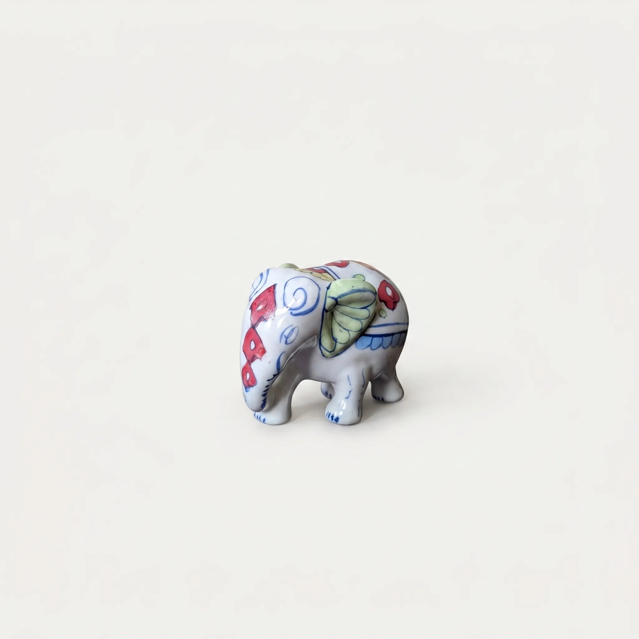 Hand-Painted Ceramic Elephant Figurine – 4” Decorative Blue Pottery Accent
