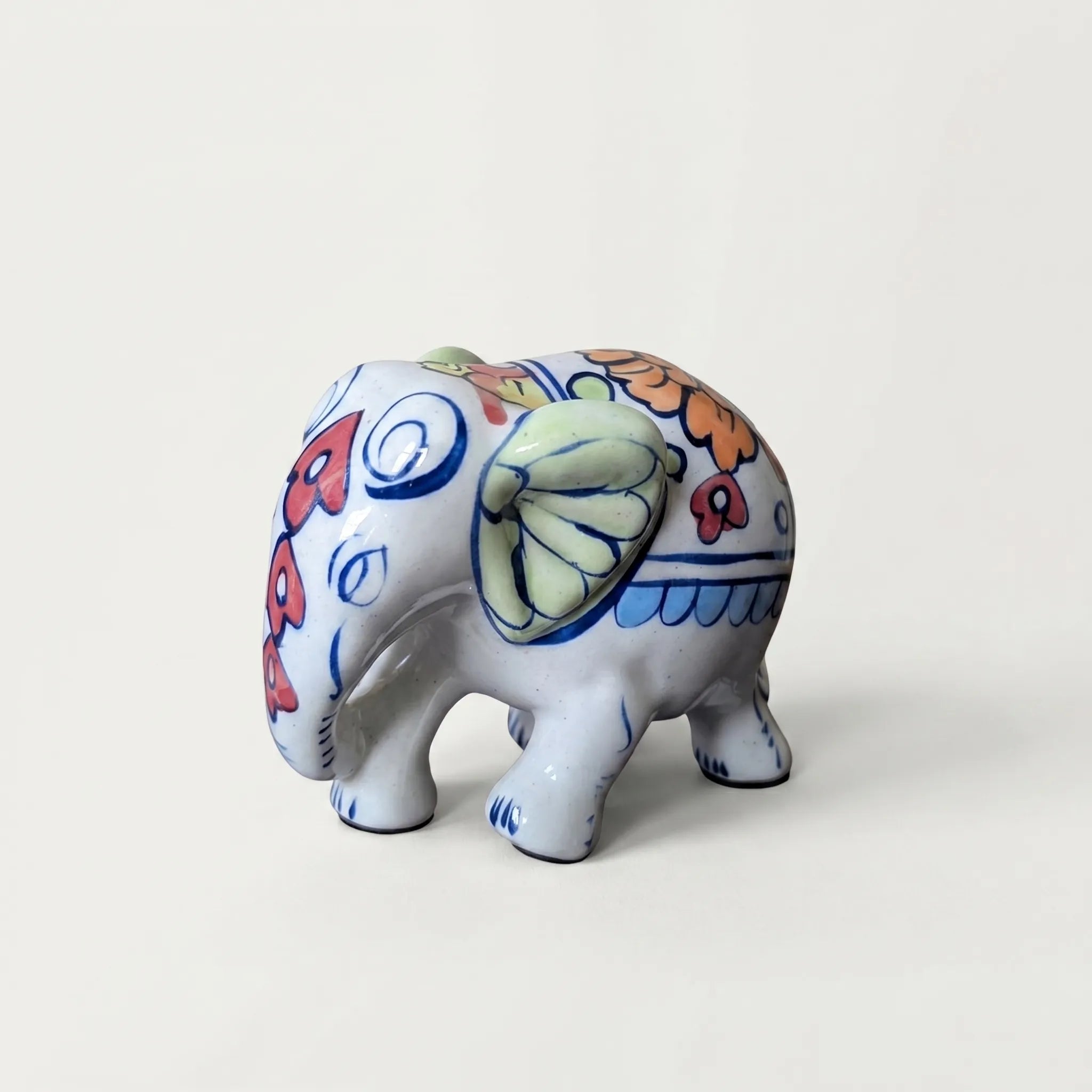 Hand-Painted Ceramic Elephant Figurine – 4” Decorative Blue Pottery Accent