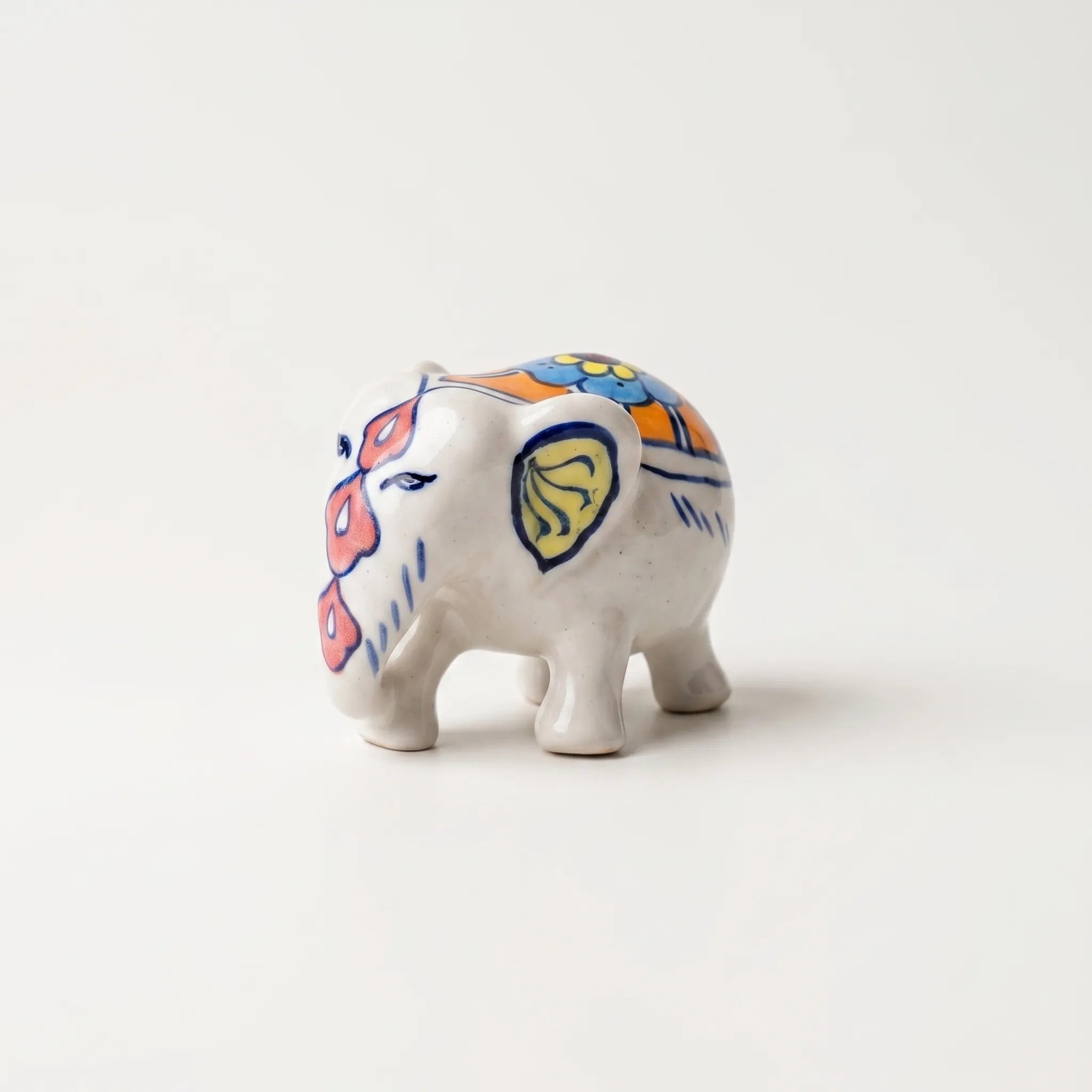 Hand-Painted Ceramic Elephant Figurine – 4” Decorative Blue Pottery Home Decor