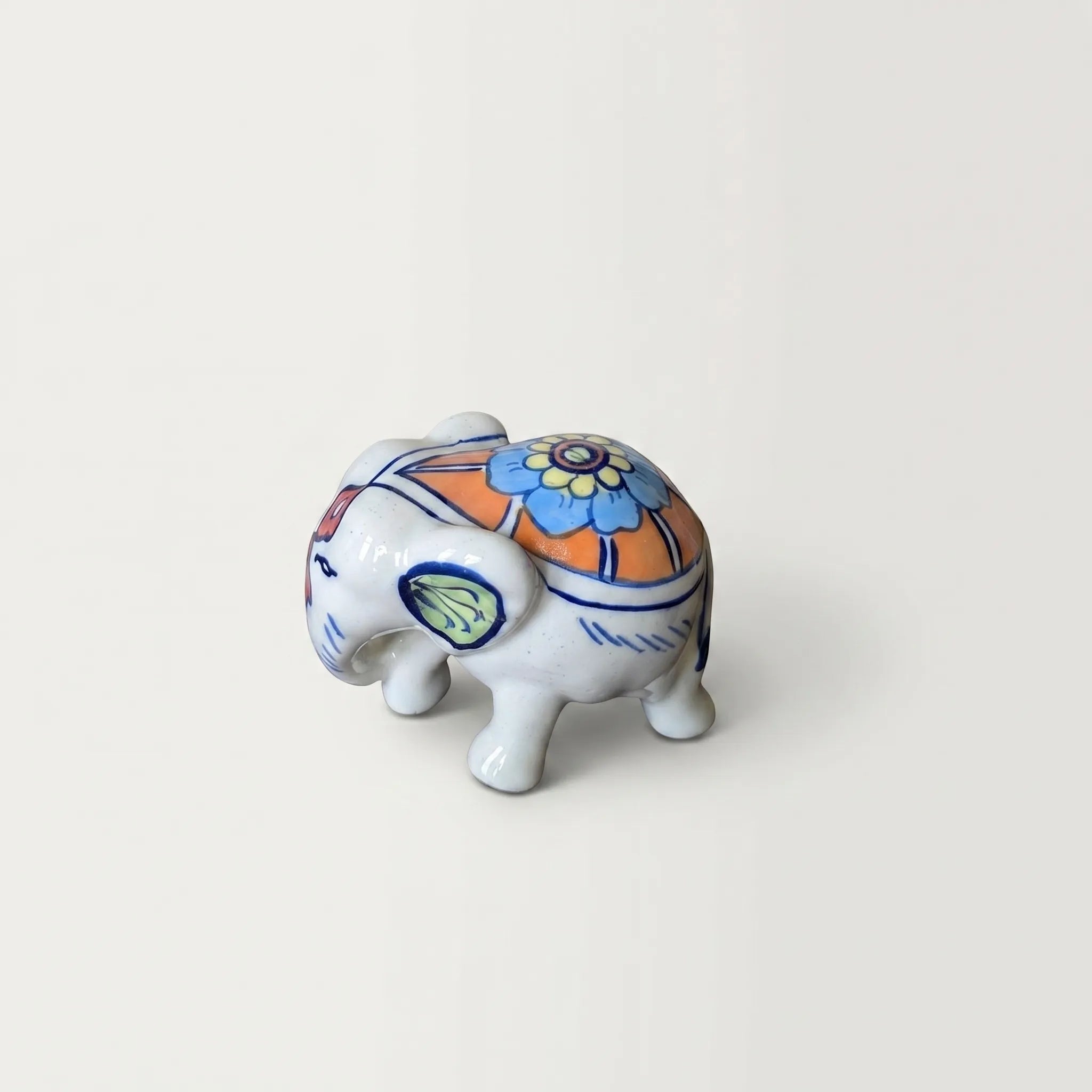 Hand-Painted Ceramic Elephant Figurine – 4” Decorative Blue Pottery Home Decor