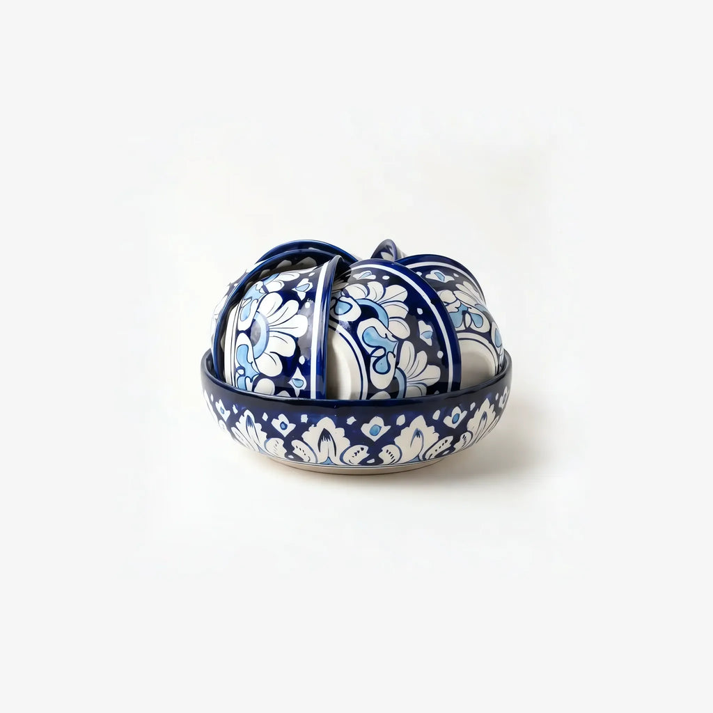 Blue pottery sweet bowl set with six small bowls nested in the large bowl