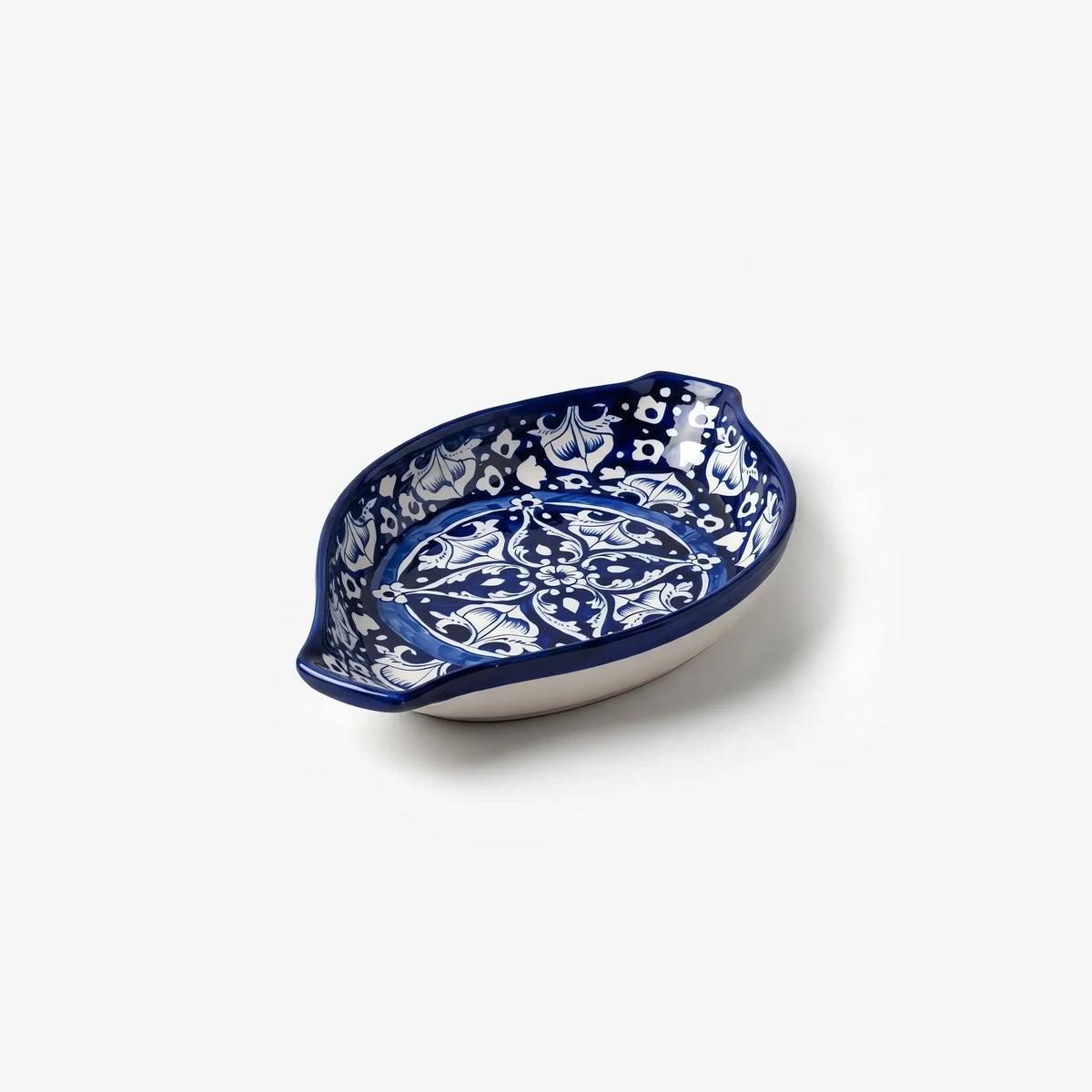 Angled view of the cobalt oval rice dish