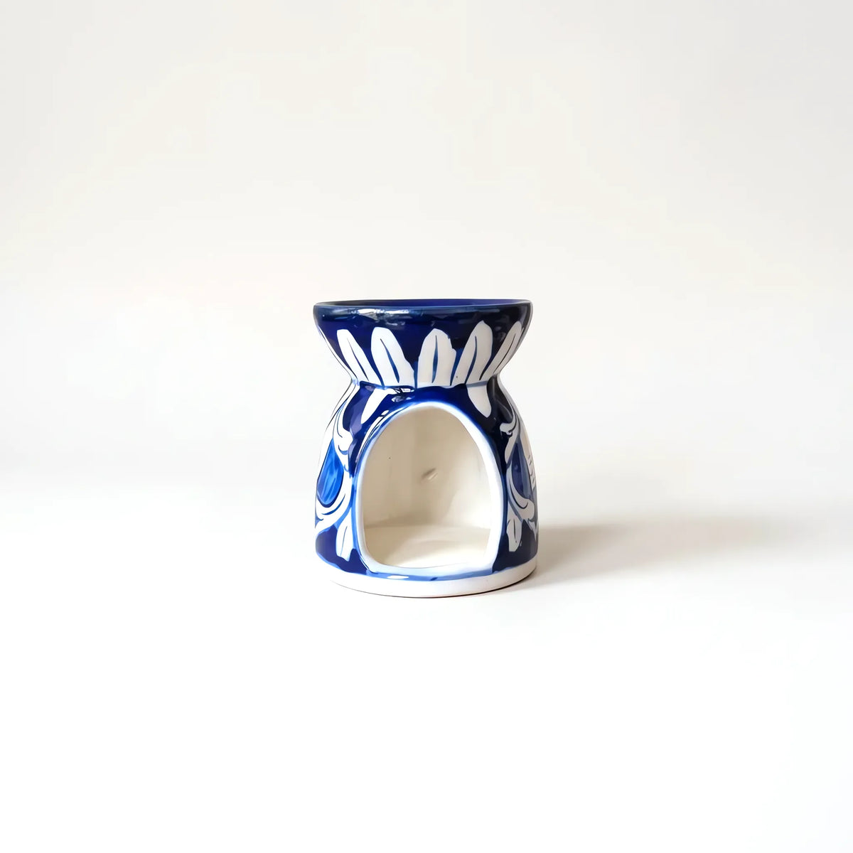 Front opening of the blue pottery oil burner