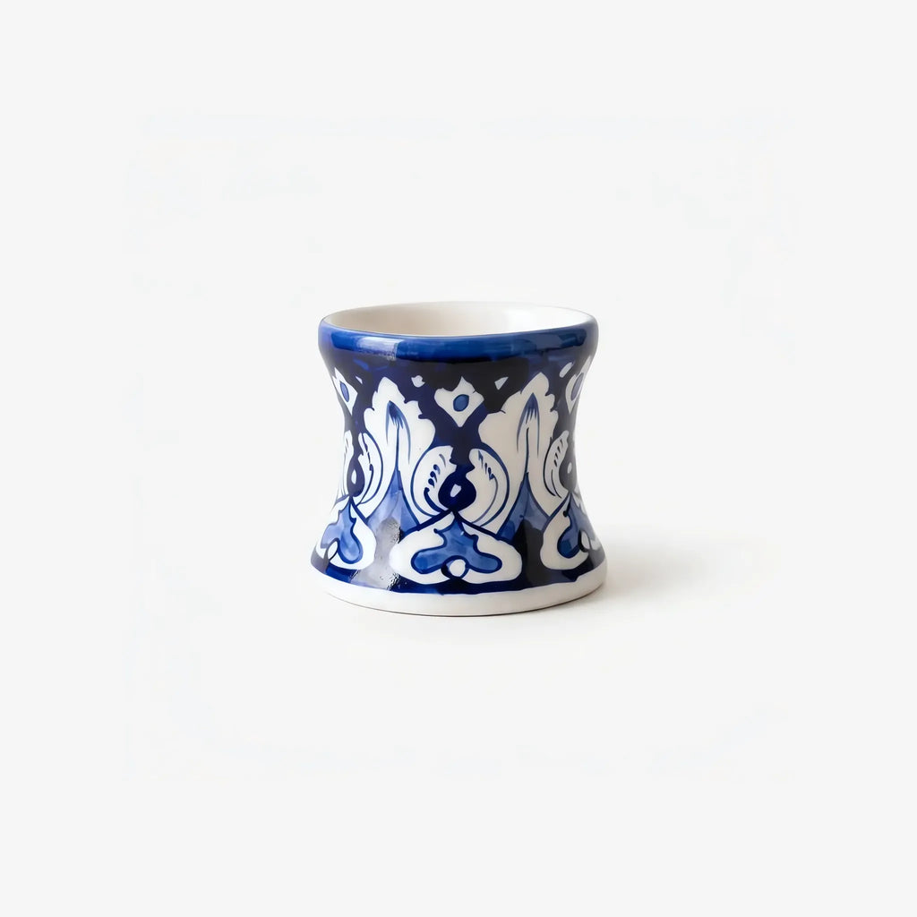 Side view of the cobalt arabesque candle stand