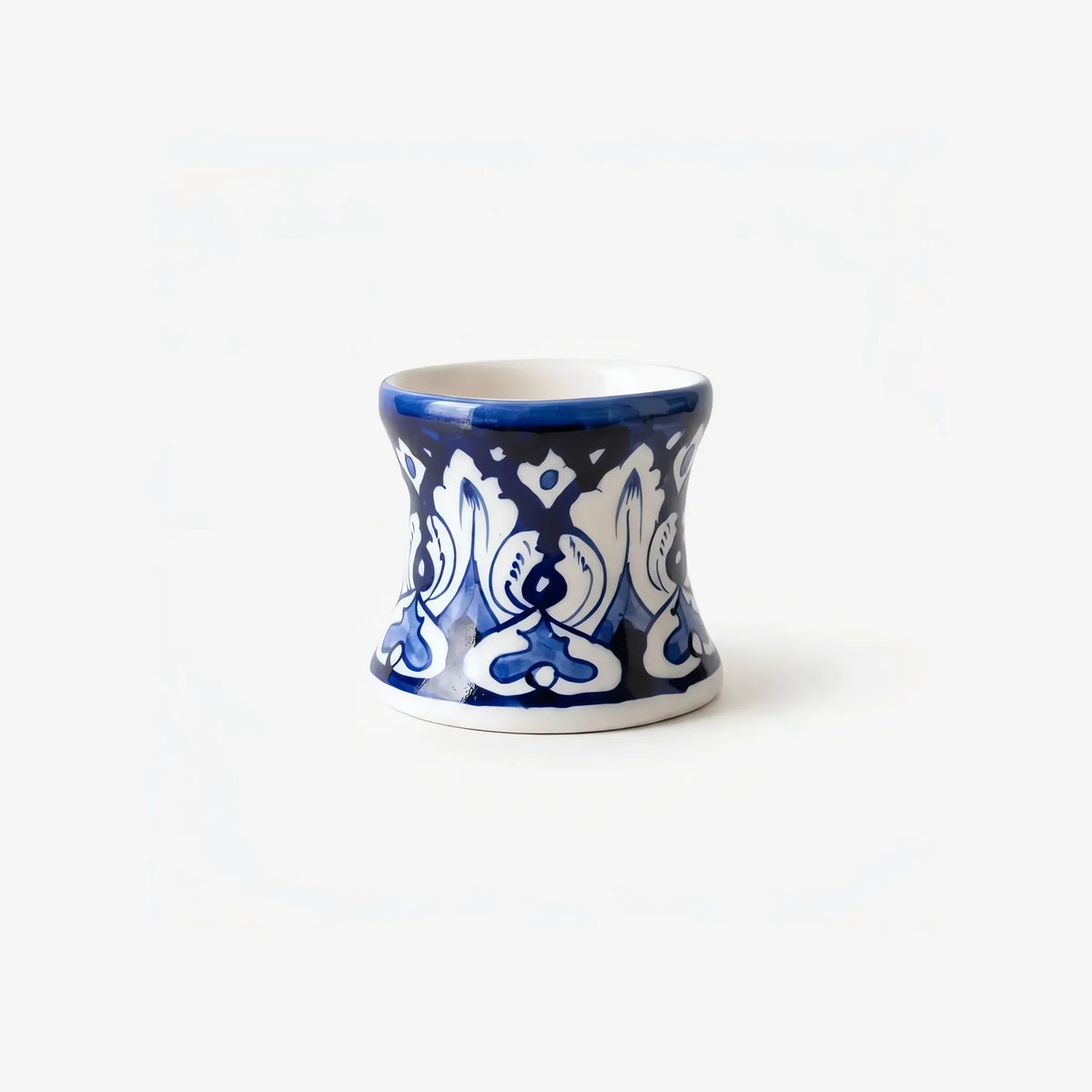 Side view of the cobalt arabesque candle stand