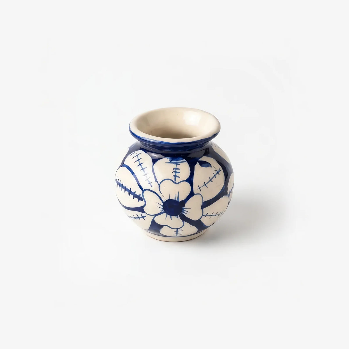 3 inch blue pottery garwi with a large stitched petal flower