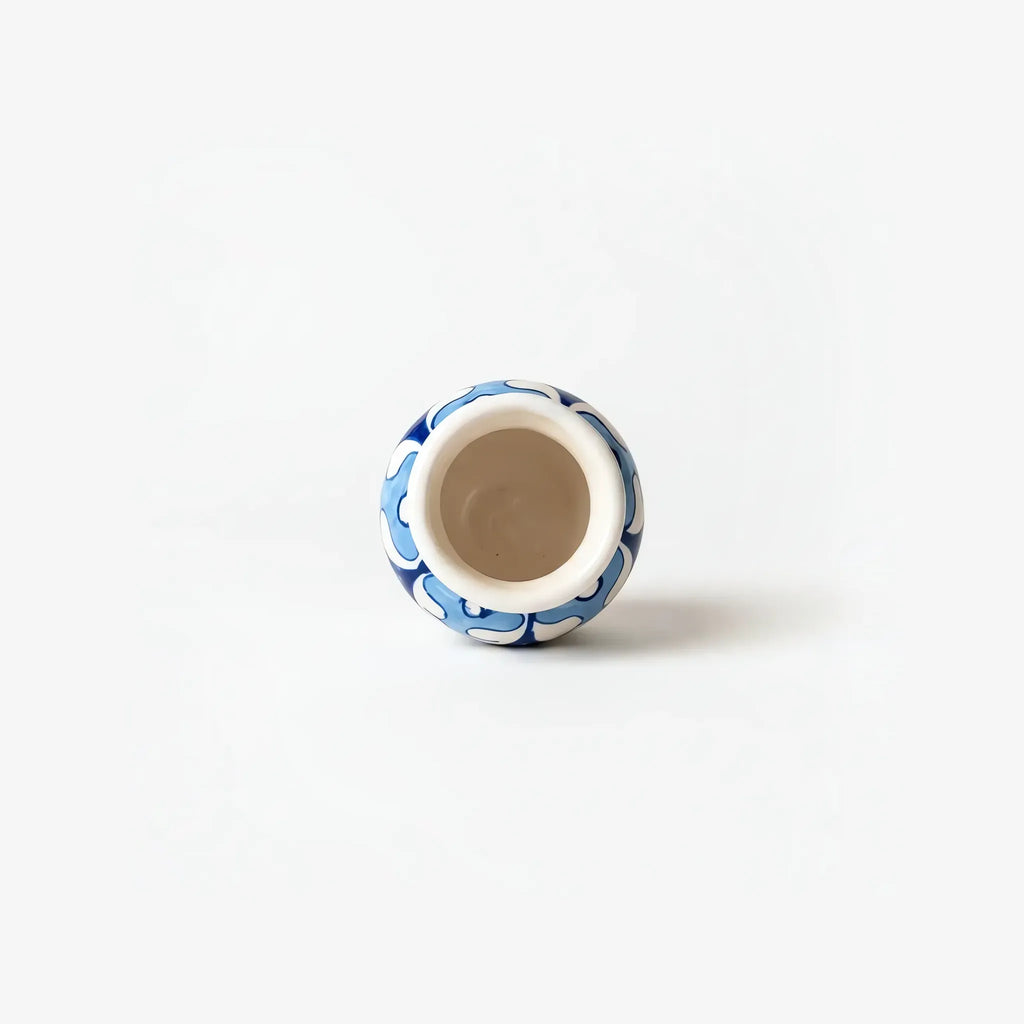 Top view into the sky-blue mini vase