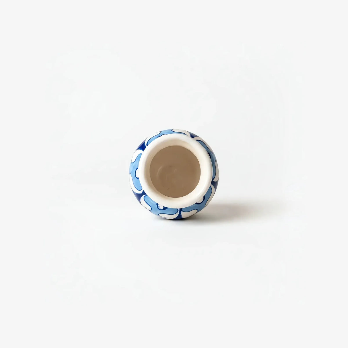 Top view into the sky-blue mini vase