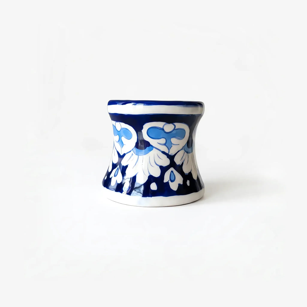 Side view of the cobalt and white blue pottery candle stand