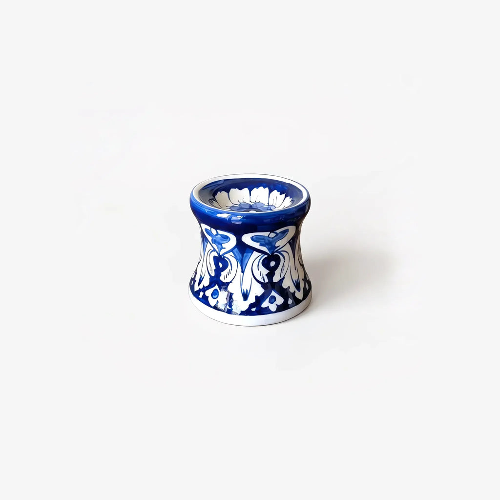 3 inch blue pottery candle stand with white heart scrolls