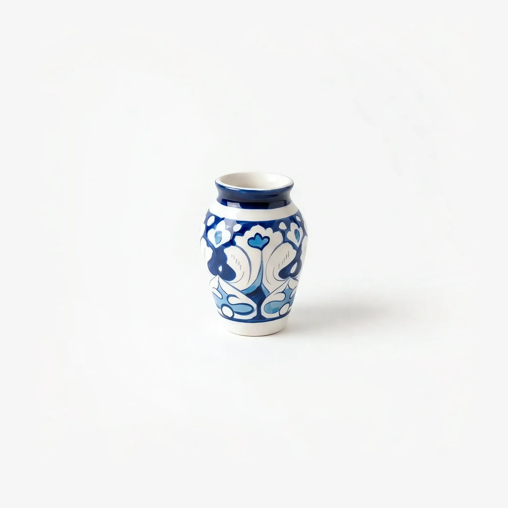 4 inch blue pottery mini vase with white and sky-blue heart scrolls