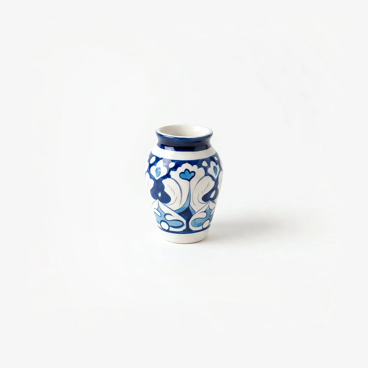 4 inch blue pottery mini vase with white and sky-blue heart scrolls
