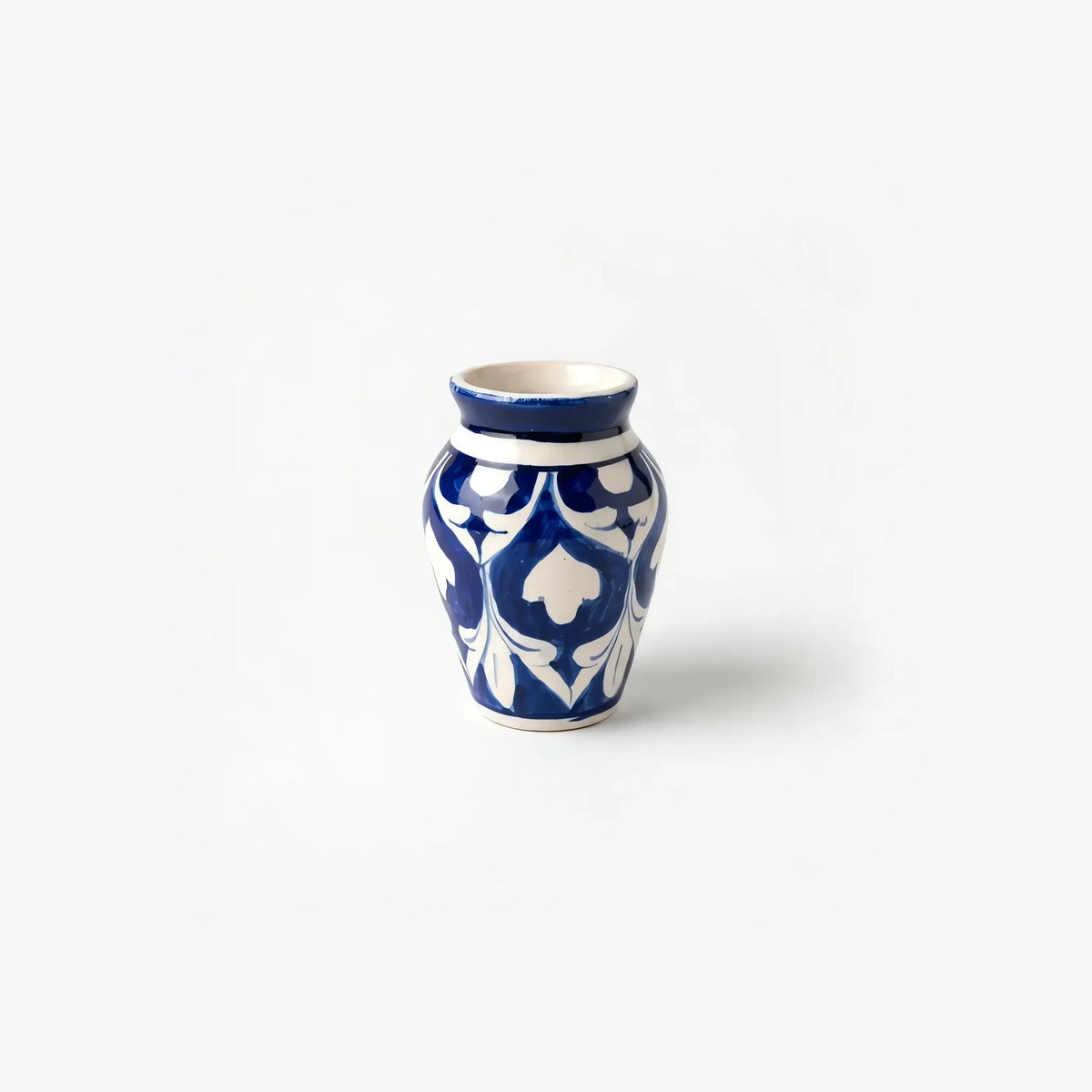 4 inch blue pottery mini vase with white hearts on cobalt
