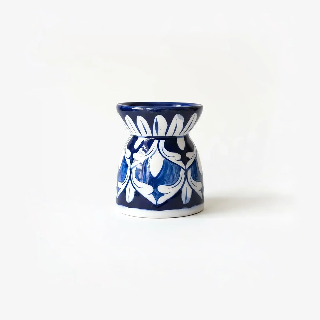 4 inch blue pottery oil burner with white arabesque on cobalt