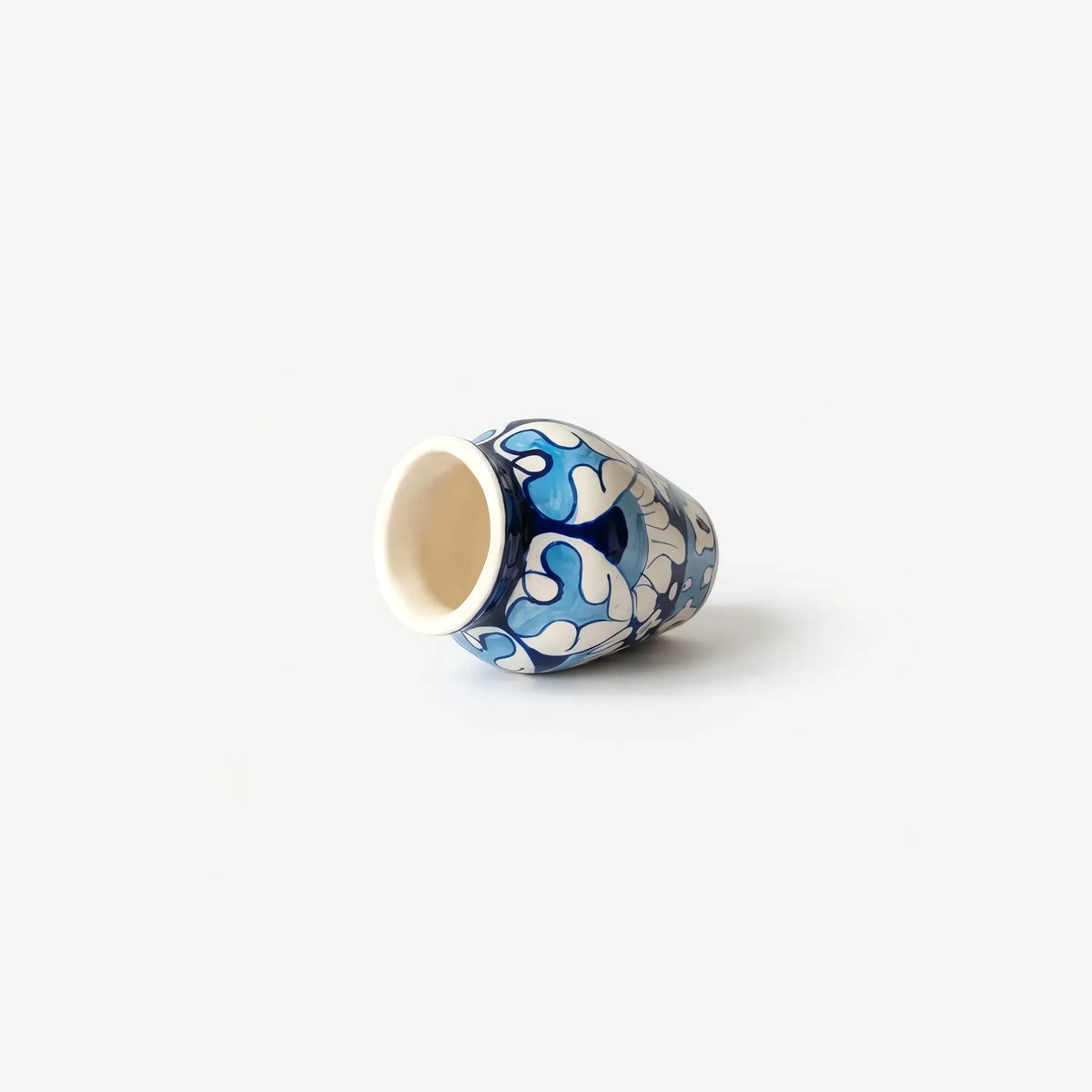 Mini vase lying on its side showing the mouth