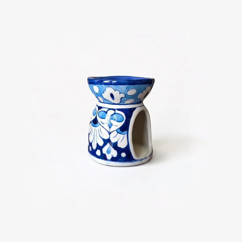 4 inch blue pottery oil burner with sky-blue band and white palmettes